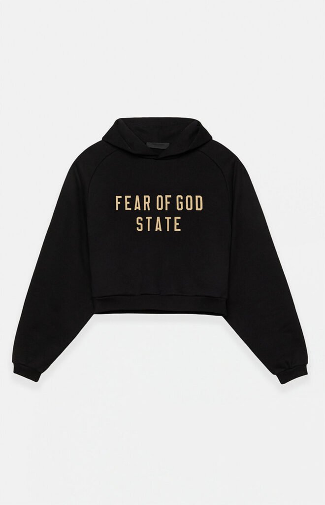 Black cropped hoodie featuring "Fear of God State" text, designed for women in soft fleece material