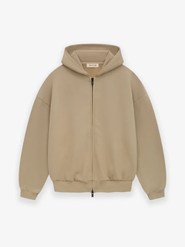 Beige Fear of God Essentials full zip hoodie featuring a front zipper.