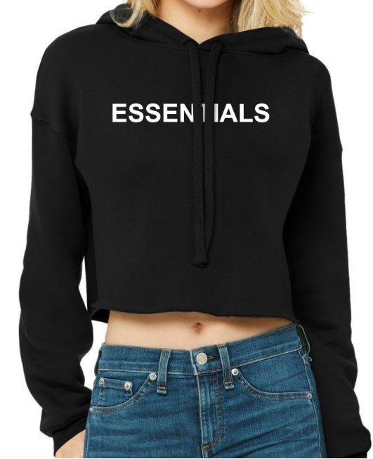 Black Essentials cropped hoodie displayed on a plain background, showcasing its stylish and modern design.