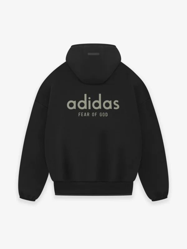 . Black adidas Fear of God Essentials Heavy Fleece hoodie displayed on a plain background.